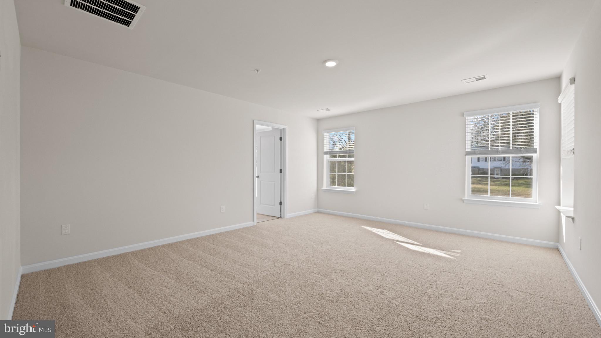 8 Comes Rdg Court Rosedale, MD 21237 - Photo 33 of 54 an empty room with windows