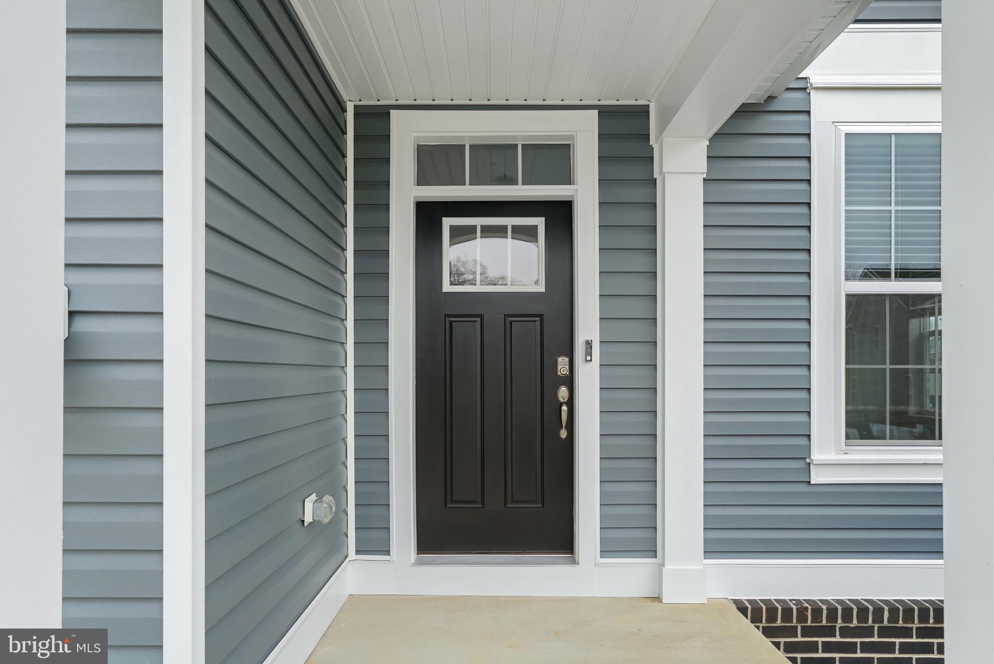 8 Comes Rdg Court Rosedale, MD 21237 - Photo 4 of 35 a view of front door of house