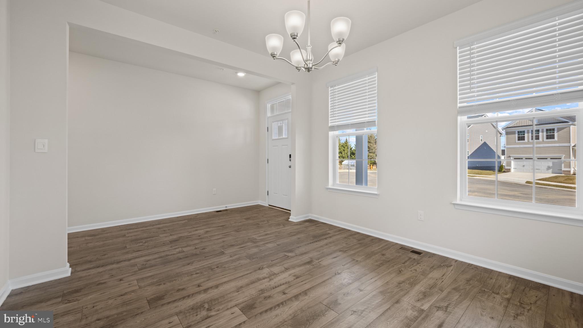 8 Comes Rdg Court Rosedale, MD 21237 - Photo 5 of 54 a view of an empty room with a window