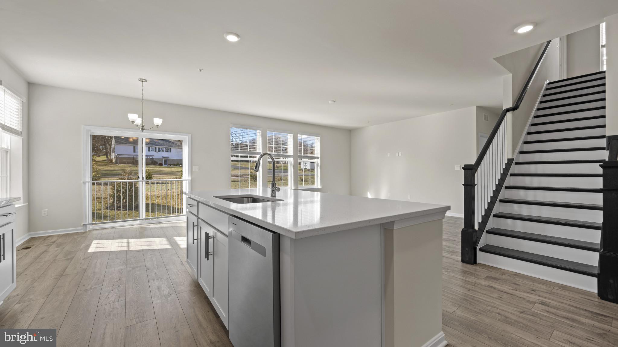 8 Comes Rdg Court Rosedale, MD 21237 - Photo 8 of 54 wooden floor in an empty room with a window