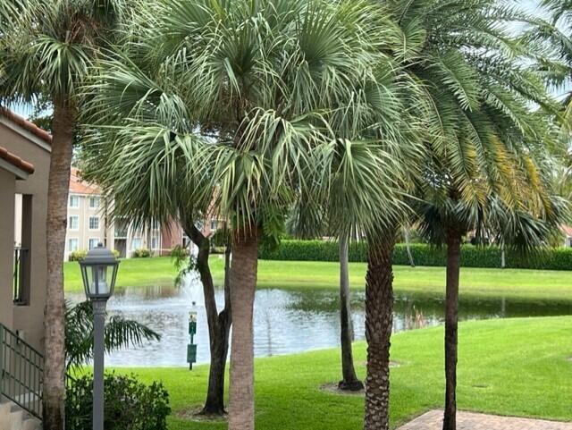7848 Sonoma Springs Circle, Unit 202 Lake Worth, FL 33463 - Photo 3 of 16 a view of a garden with plants