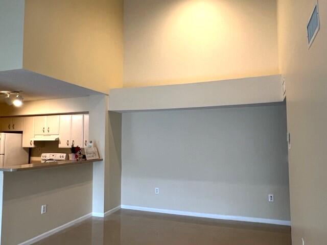 7848 Sonoma Springs Circle, Unit 202 Lake Worth, FL 33463 - Photo 6 of 16 a view of open kitchen with a sink and dishwasher