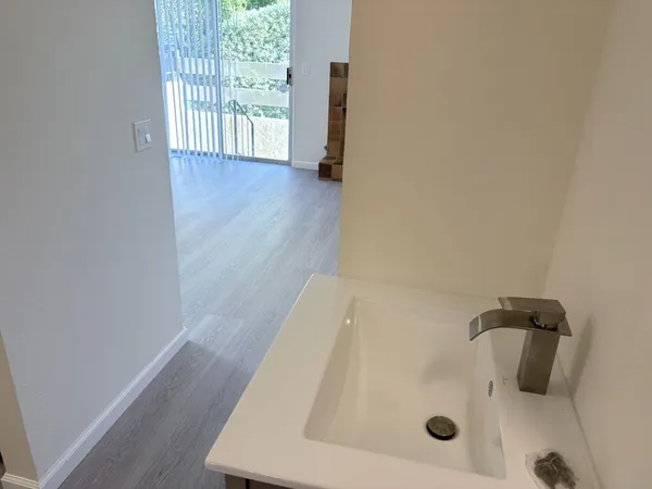 a bathroom with a sink and a tub