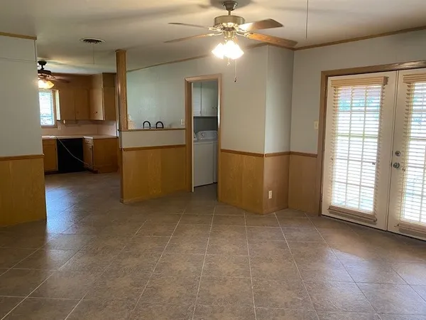 a view of a kitchen with a sink cabinets and a kitchen