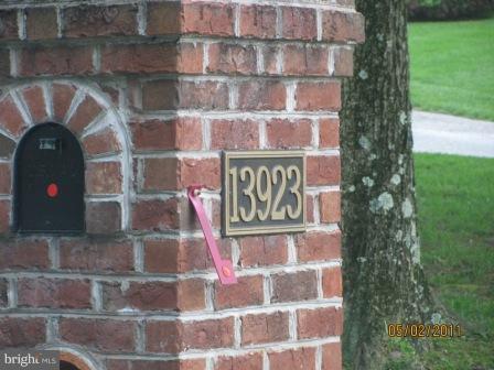 13923 Sunnybrook Road Phoenix, MD 21131 - Photo 7 of 10 a sign that is on the side of a building