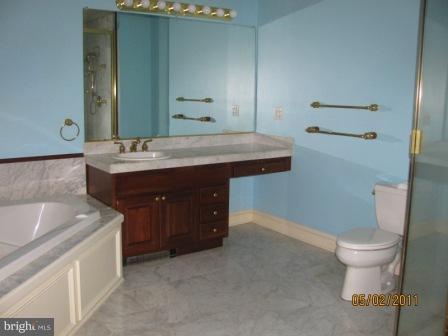 13923 Sunnybrook Road Phoenix, MD 21131 - Photo 10 of 10 a bathroom with a sink and a toilet