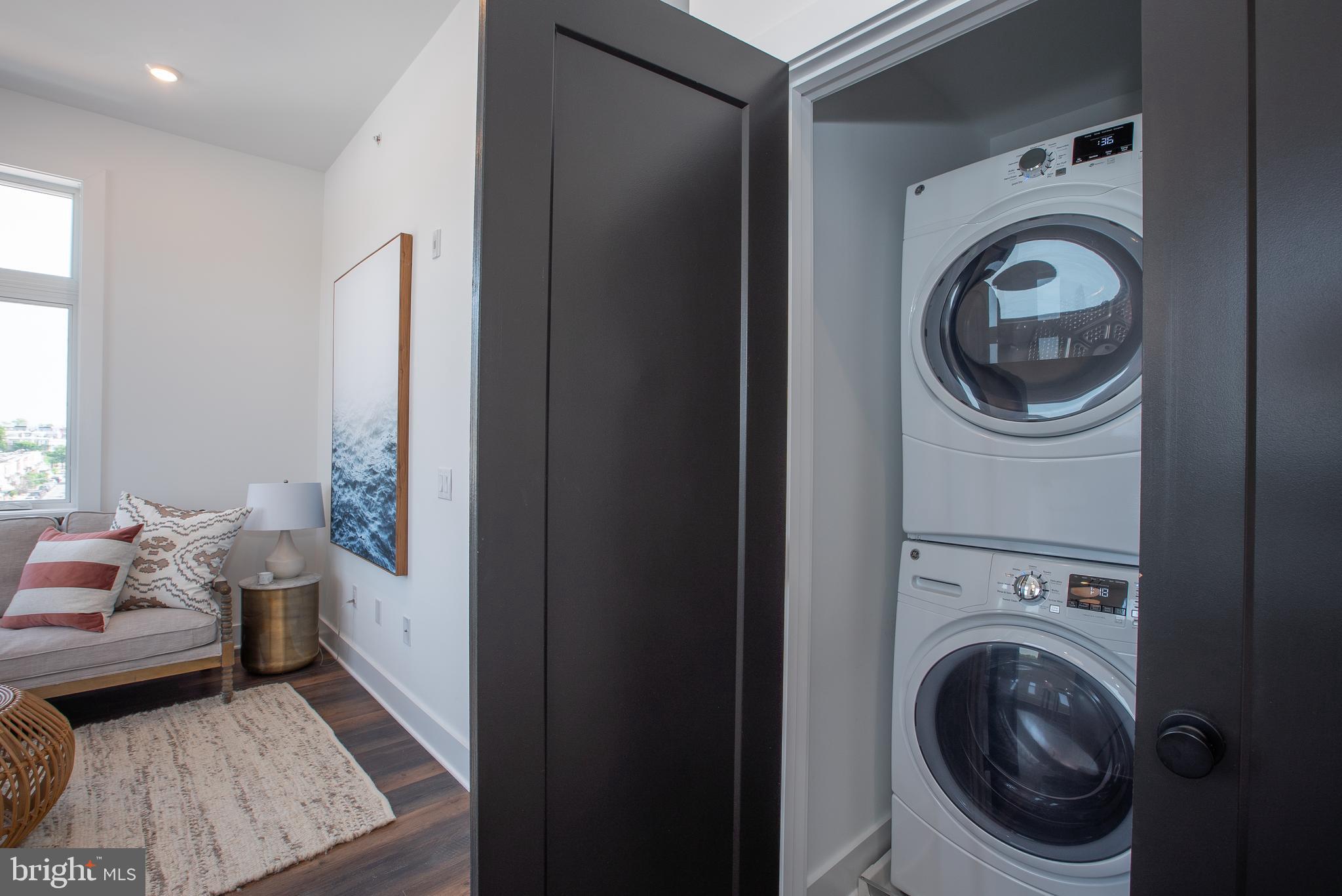 2940 West Thompson Street, Unit 302 Philadelphia, PA 19121 - Photo 20 of 43 a view of living room washer and dryer