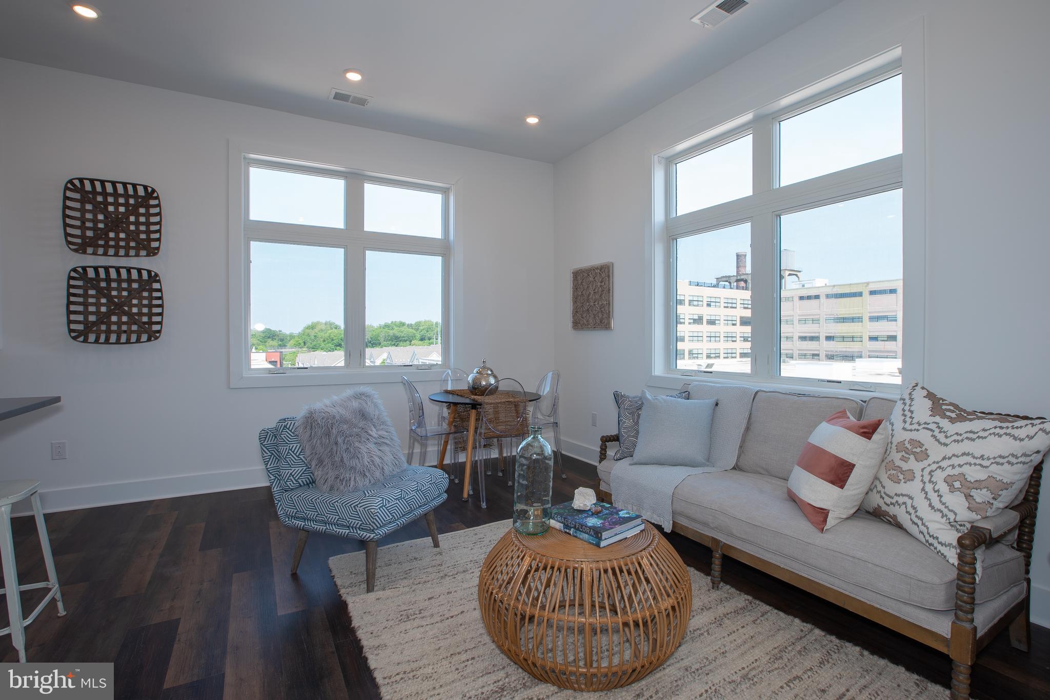 2940 West Thompson Street, Unit 302 Philadelphia, PA 19121 - Photo 21 of 43 a living room with furniture and a window
