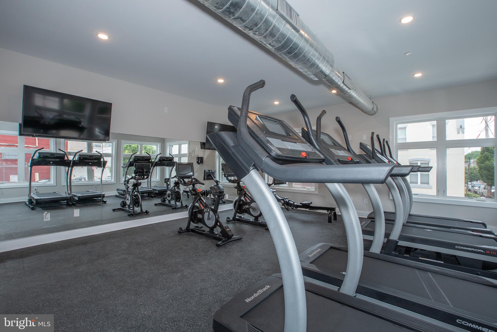2940 West Thompson Street, Unit 302 Philadelphia, PA 19121 - Photo 6 of 43 a view of a room with gym equipment