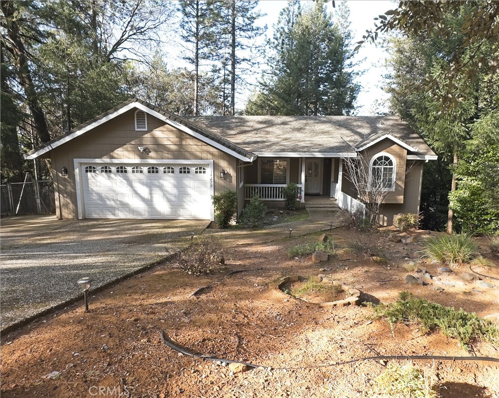 14279 Carnegie Road Magalia, CA 95954 - Photo 1 of 38 a front view of a house with a yard
