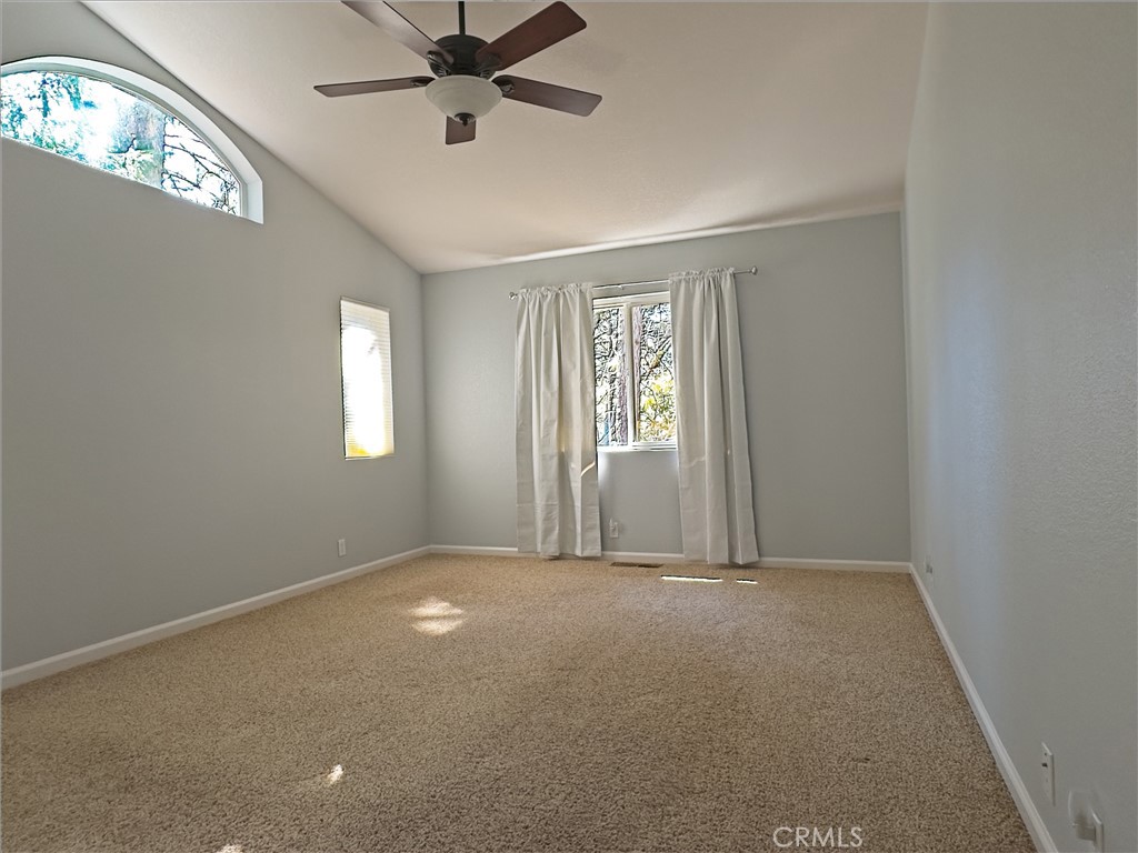 14279 Carnegie Road Magalia, CA 95954 - Photo 16 of 38 an empty room with windows and closet