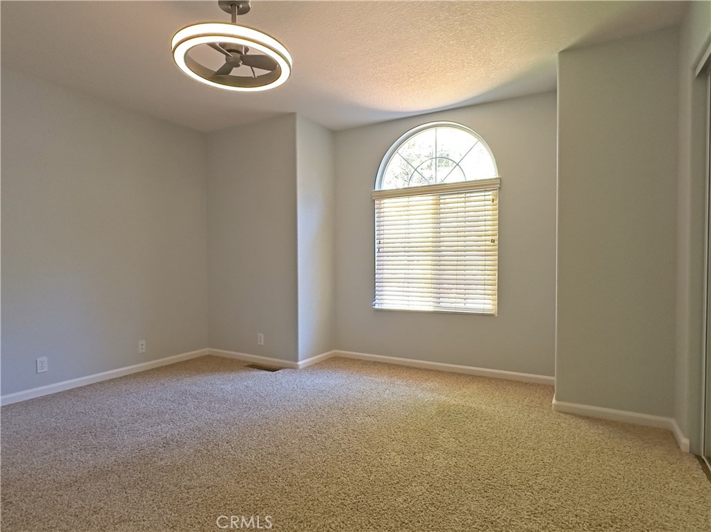 14279 Carnegie Road Magalia, CA 95954 - Photo 26 of 38 an empty room with a window
