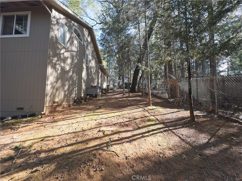 14279 Carnegie Road Magalia, CA 95954 - Photo 33 of 38 a view of a house with a yard