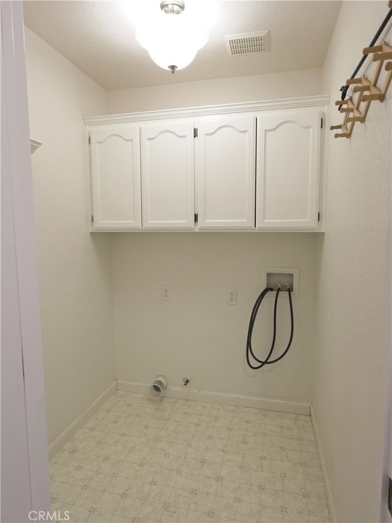 14279 Carnegie Road Magalia, CA 95954 - Photo 8 of 38 a bathroom with a shower and cabinets