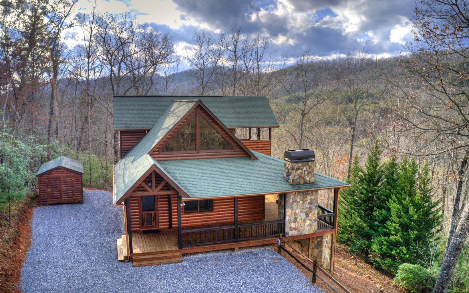 422 Weaver Creek Way Blue Ridge, GA 30513 - Photo 1 of 1 a house view with a garden