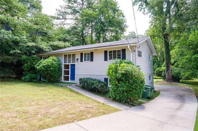 front view of a house with a yard