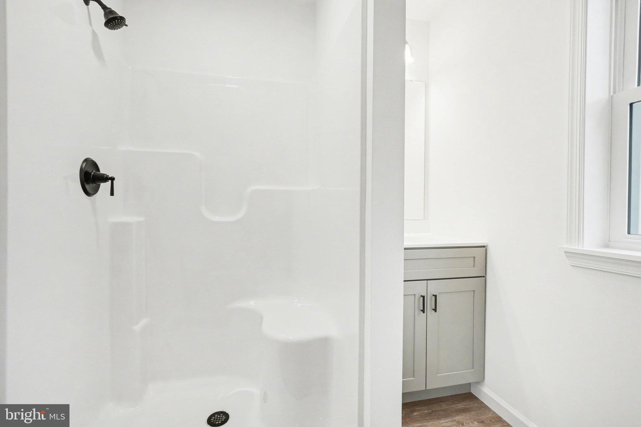 418 Elm Street Lebanon, PA 17042 - Photo 18 of 43 Modern shower space with sleek design.