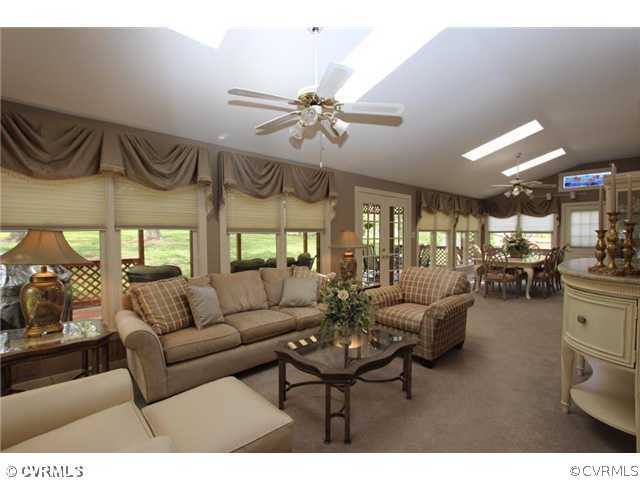 8206 Spring Meadow Road North Chesterfield, VA 23235 - Photo 15 of 24 a living room with furniture and a large window