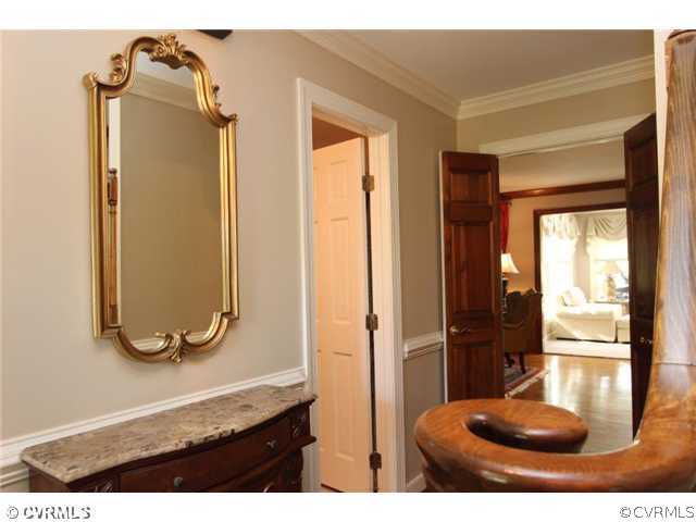 8206 Spring Meadow Road North Chesterfield, VA 23235 - Photo 6 of 24 a bathroom with a sink and mirror