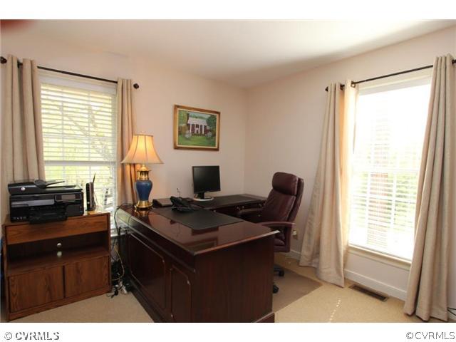 8206 Spring Meadow Road North Chesterfield, VA 23235 - Photo 9 of 24 a view of a workspace with furniture and a window