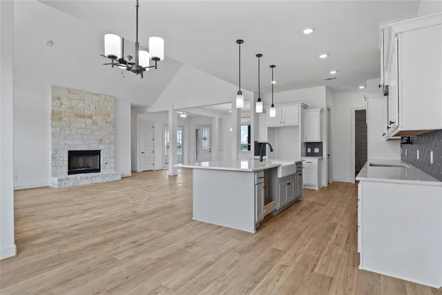a very nice looking living room with a large window