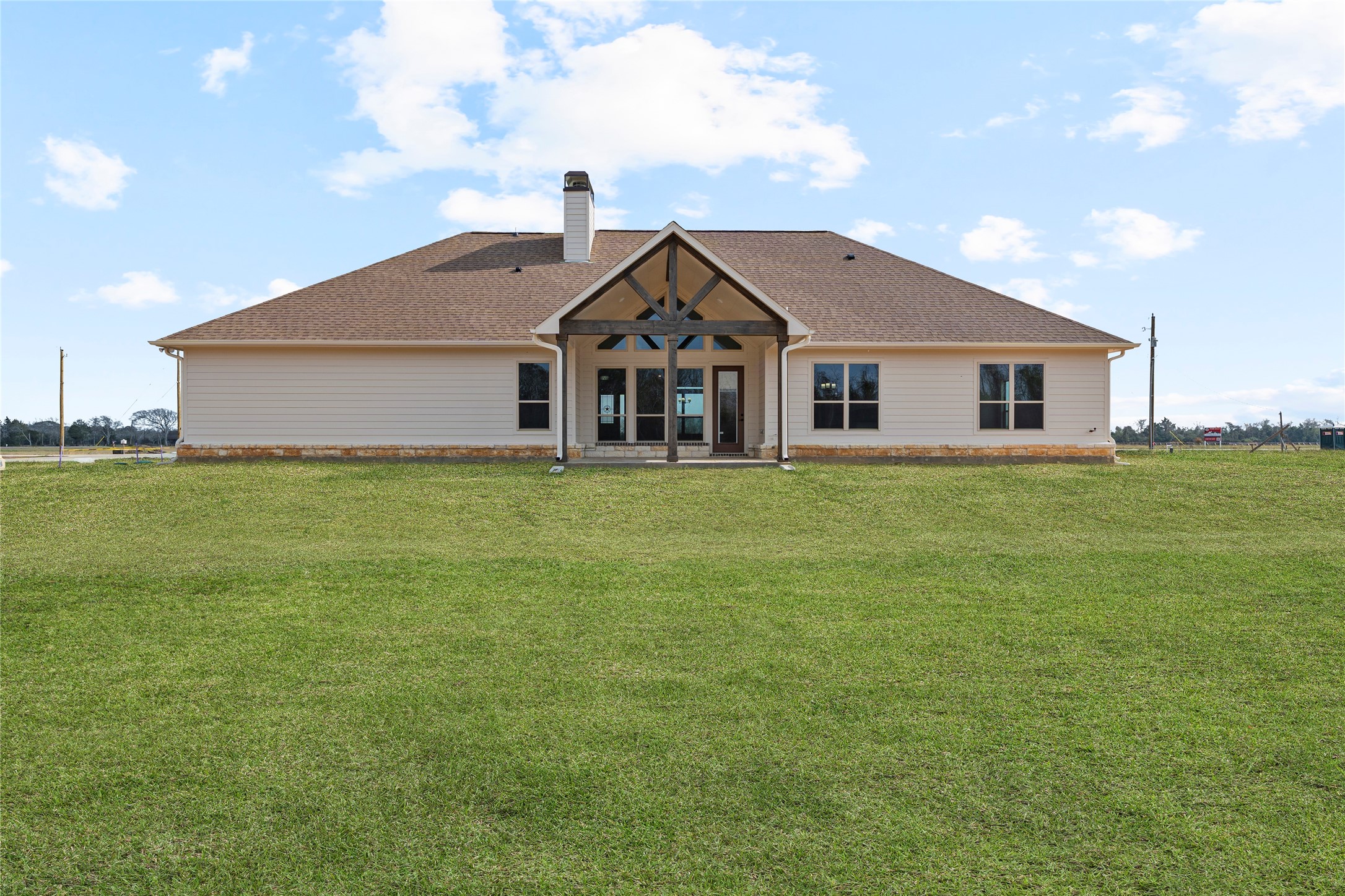 1819 Rymal Ranch Road Alvin, TX 77511 - Photo 3 of 17 a house with garden in front of it
