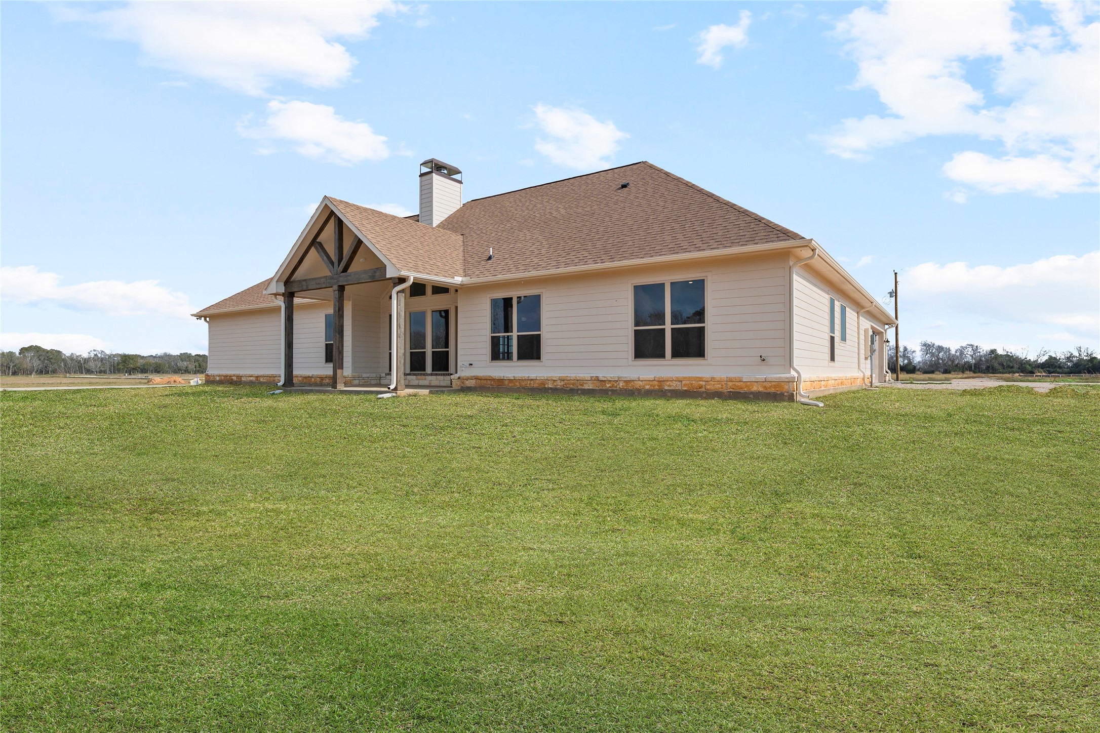 1819 Rymal Ranch Road Alvin, TX 77511 - Photo 4 of 17 a front view of house with yard and green space