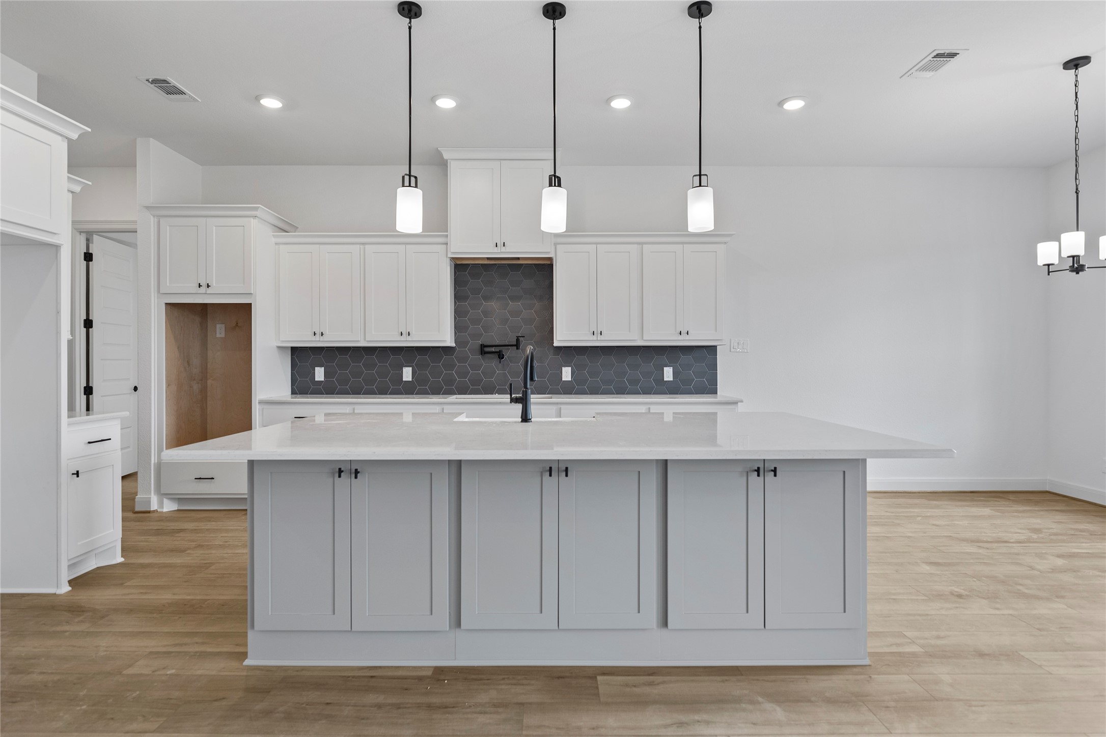 1819 Rymal Ranch Road Alvin, TX 77511 - Photo 5 of 17 a view of kitchen with stainless steel appliances sink refrigerator and microwave