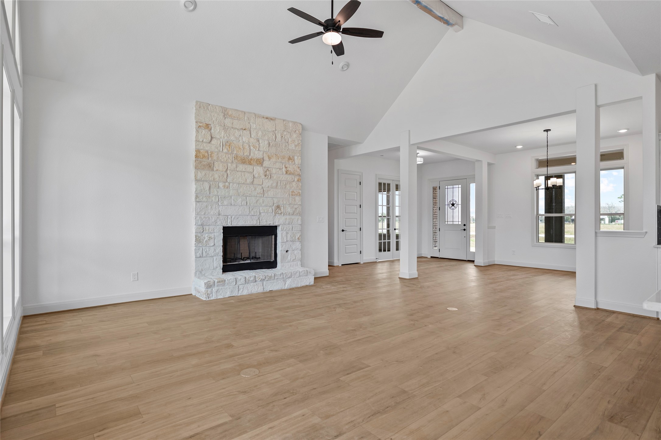 1819 Rymal Ranch Road Alvin, TX 77511 - Photo 17 of 17 a view of an empty room with a fireplace and a window