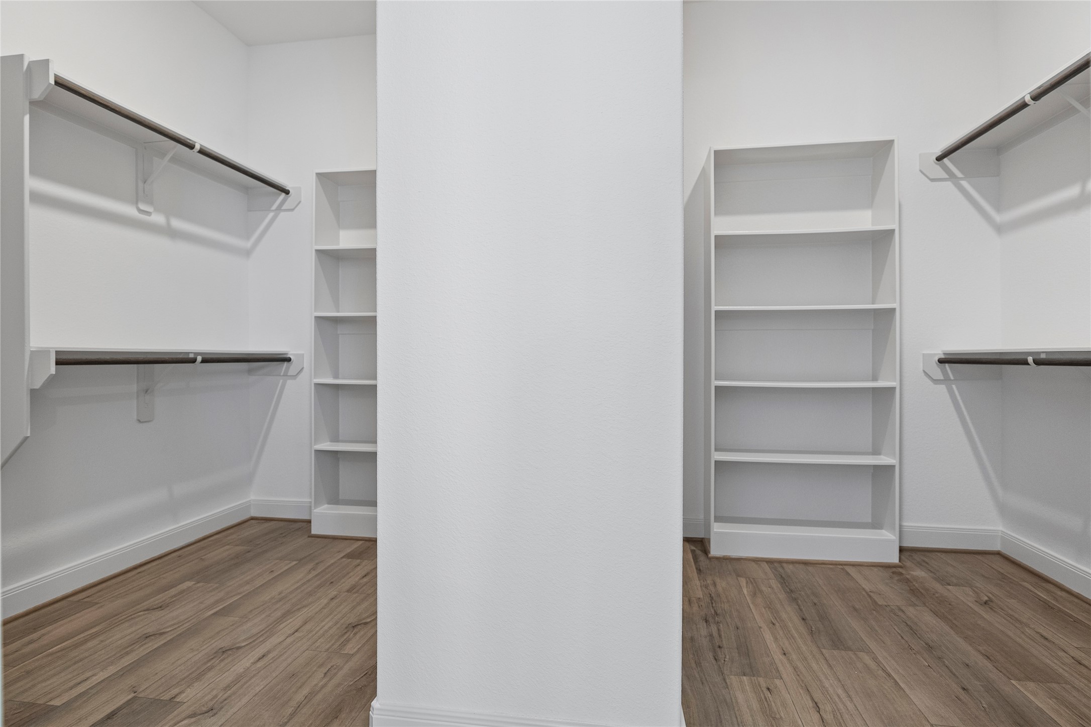 1819 Rymal Ranch Road Alvin, TX 77511 - Photo 9 of 17 a view of walk in closet with empty racks
