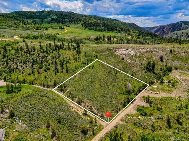 a view of outdoor space with signage and flags