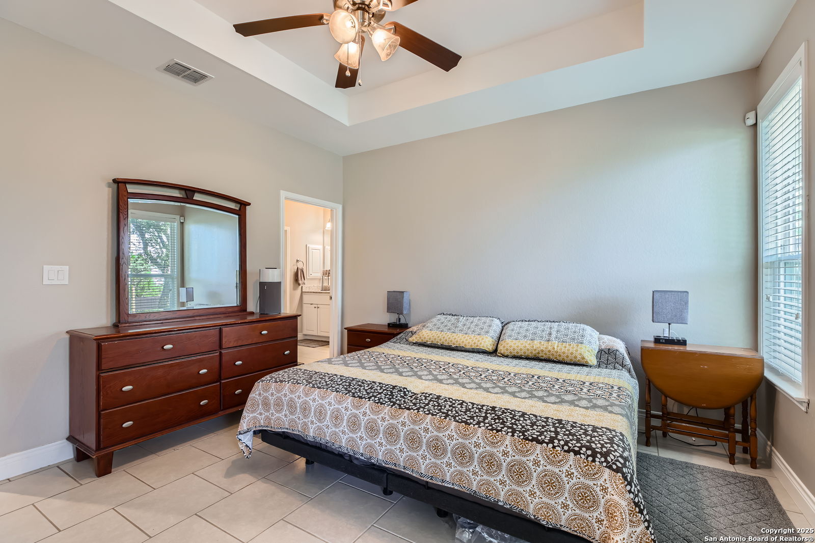 1041 Madrone Road Fischer, TX 78623 - Photo 15 of 29 a bedroom with a bed and chair