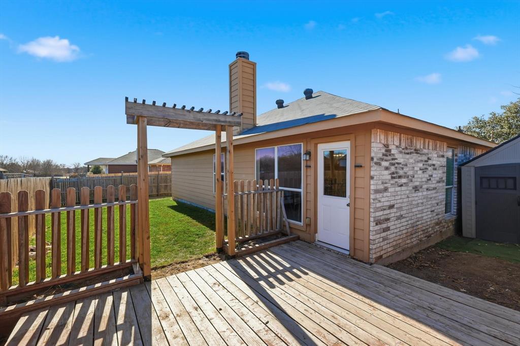 121 Kings Way Drive Rhome, TX 76078 - Photo 34 of 38 a front view of a house with a balcony