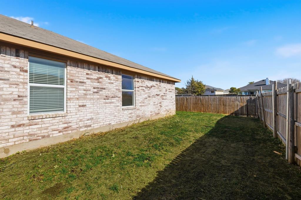 121 Kings Way Drive Rhome, TX 76078 - Photo 37 of 38 a view of a backyard