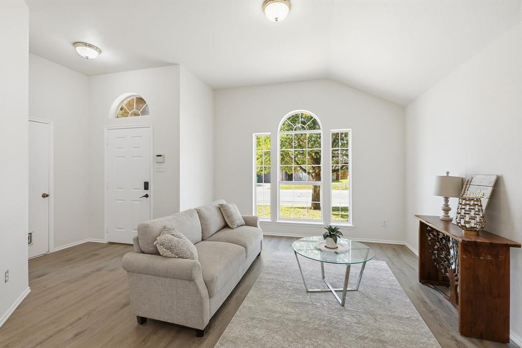 121 Kings Way Drive Rhome, TX 76078 - Photo 5 of 38 a living room with furniture and a window