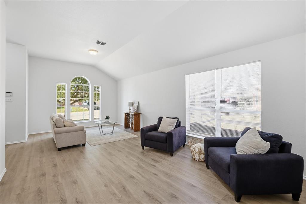 121 Kings Way Drive Rhome, TX 76078 - Photo 6 of 38 a living room with furniture and a large window