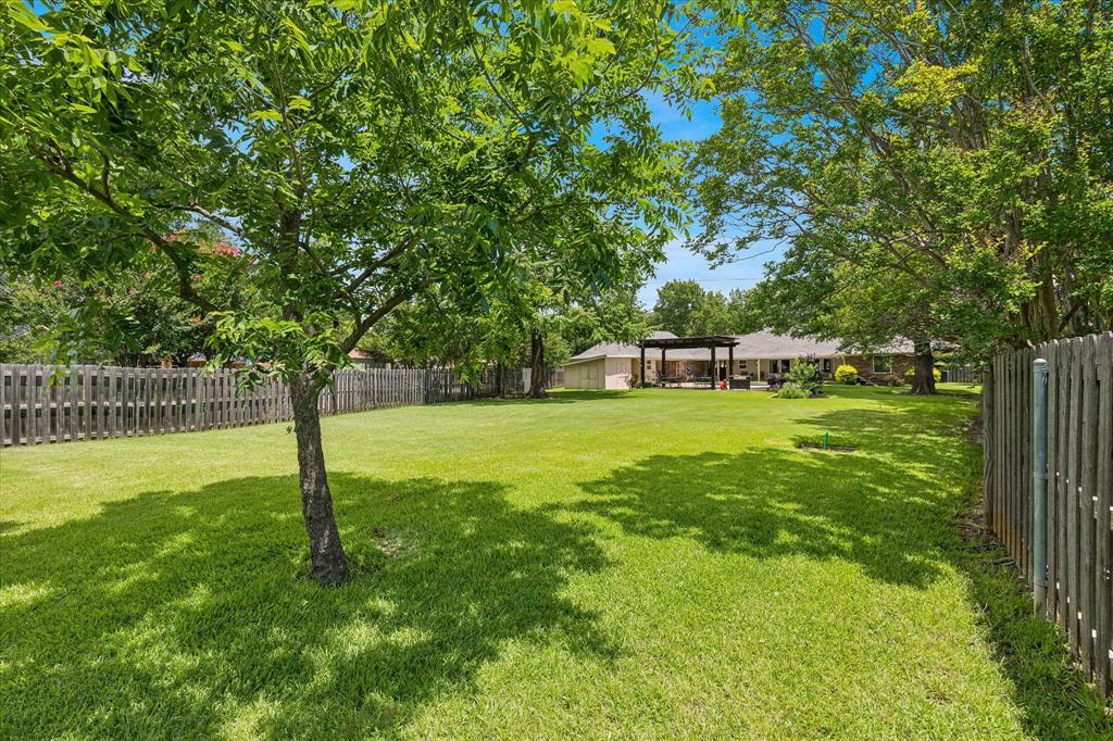 404 Moonlight Lane Keller, TX 76248 - Photo 37 of 40 a view of green field with trees in the background