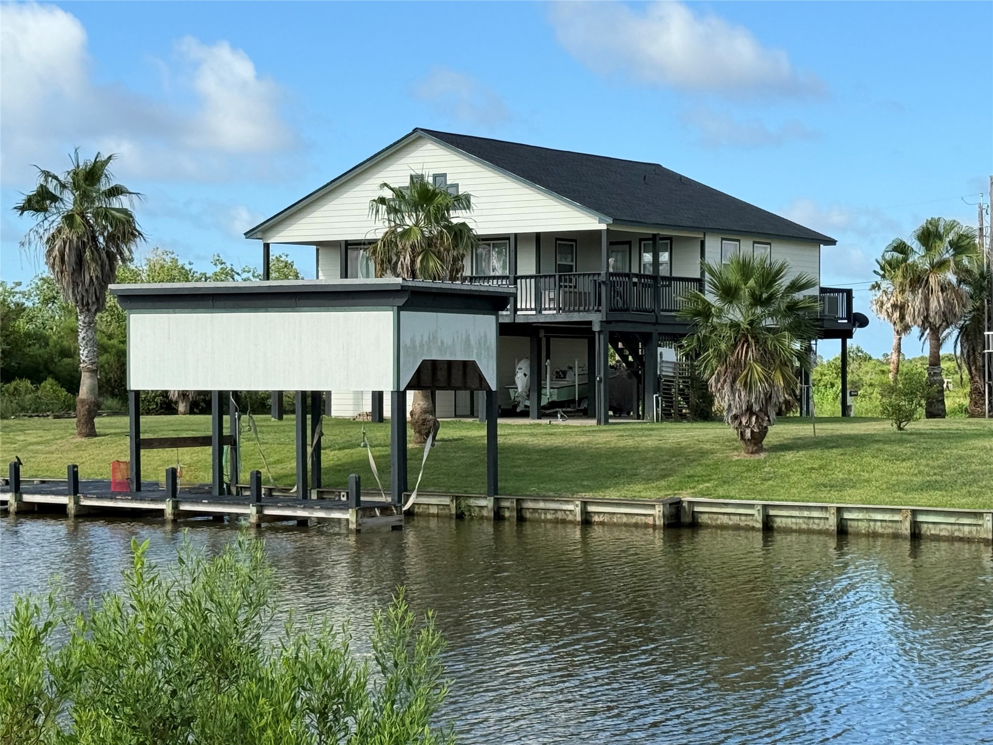 163 County Road 299 Sargent, TX 77414 - Photo 13 of 38 a view of a house with a yard