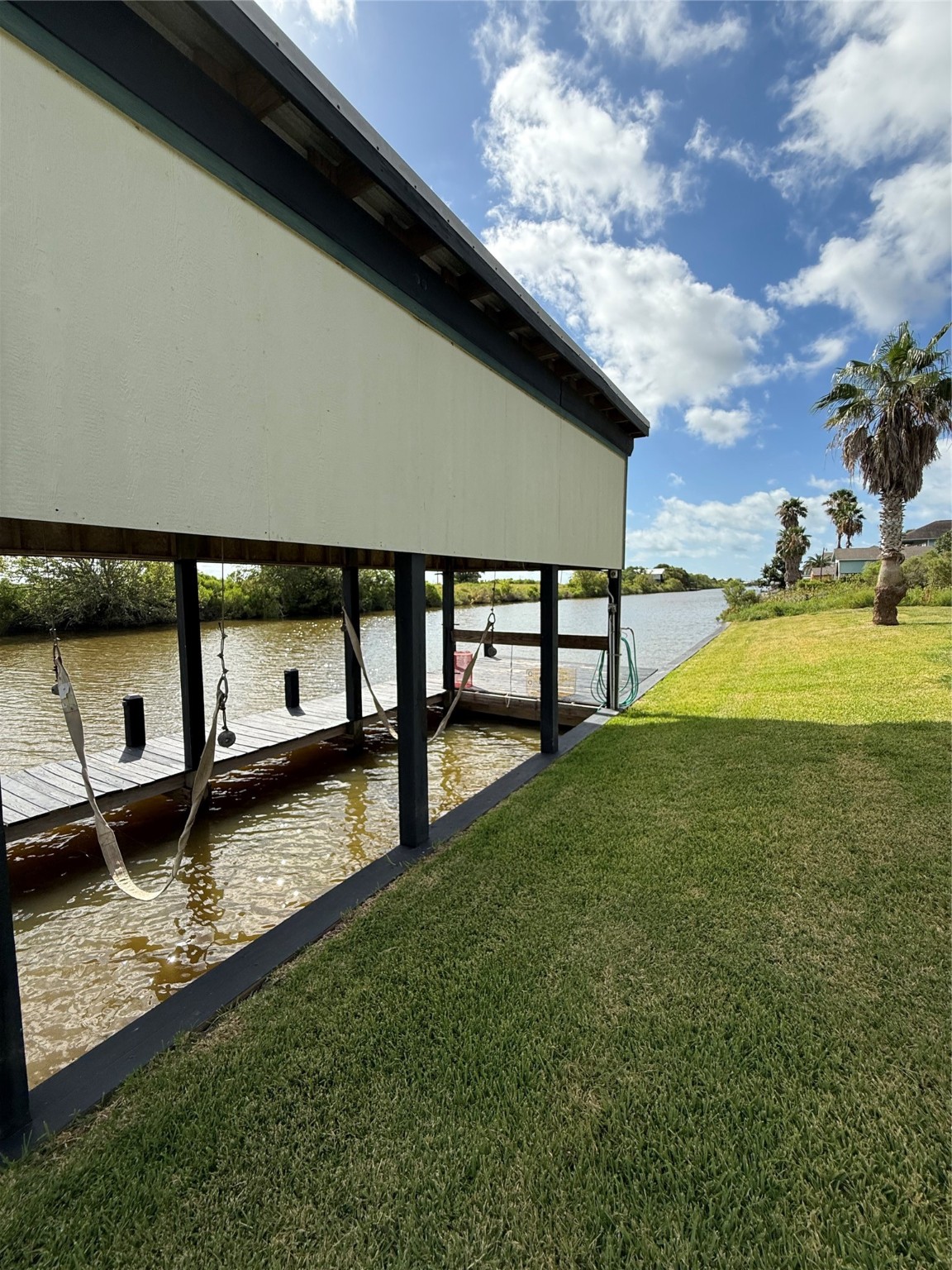 163 County Road 299 Sargent, TX 77414 - Photo 14 of 38 a backyard of a house with lots of green space