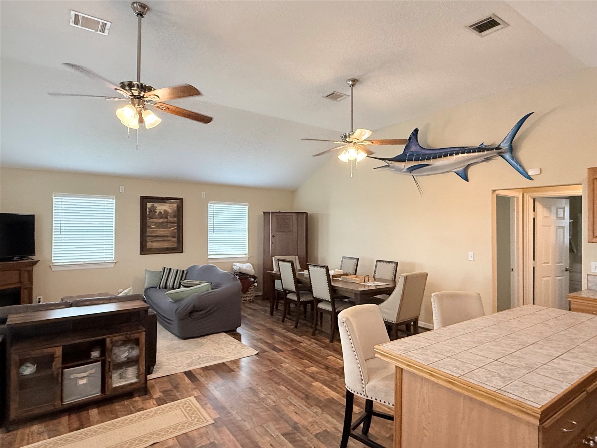163 County Road 299 Sargent, TX 77414 - Photo 20 of 38 a view of a dining room with furniture window and wooden floor