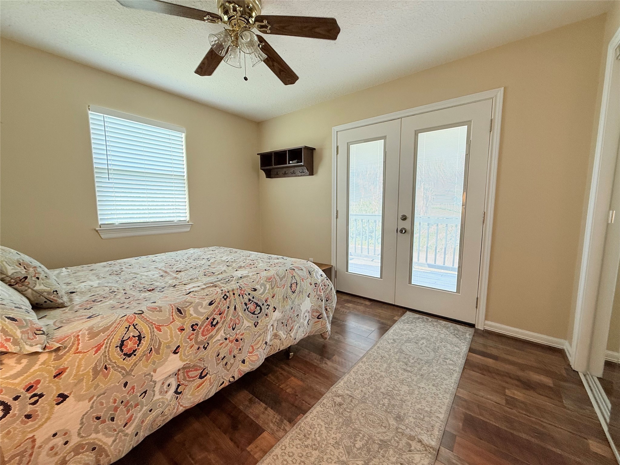 163 County Road 299 Sargent, TX 77414 - Photo 29 of 38 a bedroom with bed and window