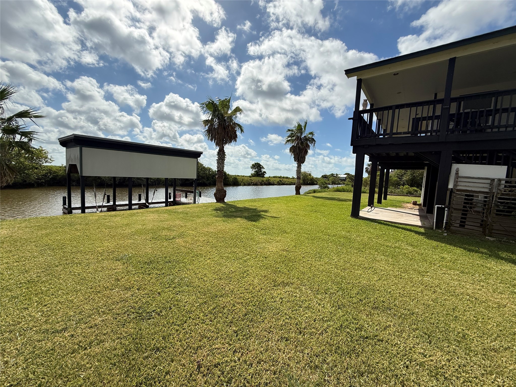 163 County Road 299 Sargent, TX 77414 - Photo 9 of 38 a view of house with outdoor space and swimming pool