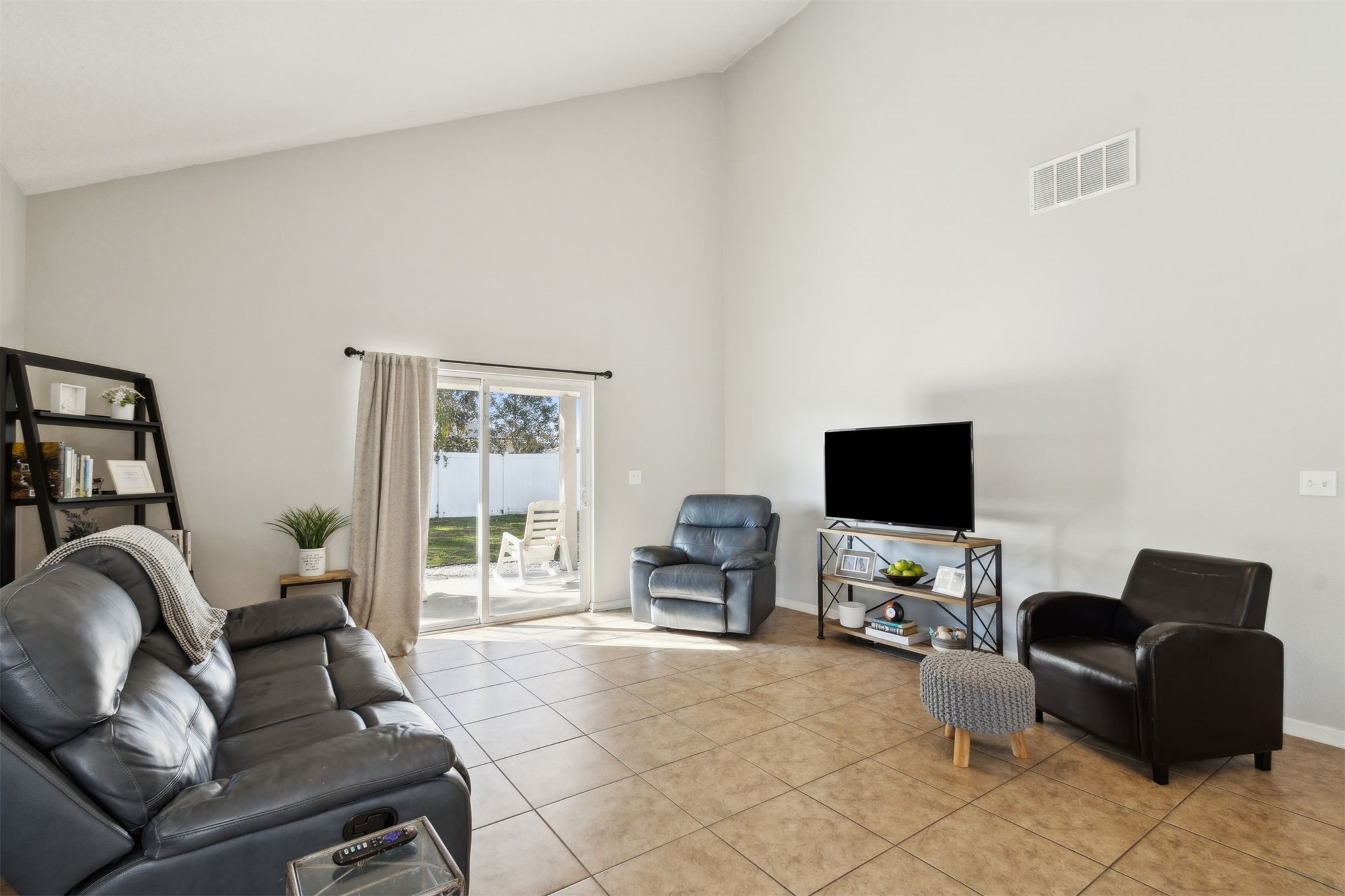 95029 Lavender Lane Fernandina Beach, FL 32034 - Photo 14 of 64 a living room with furniture and a flat screen tv