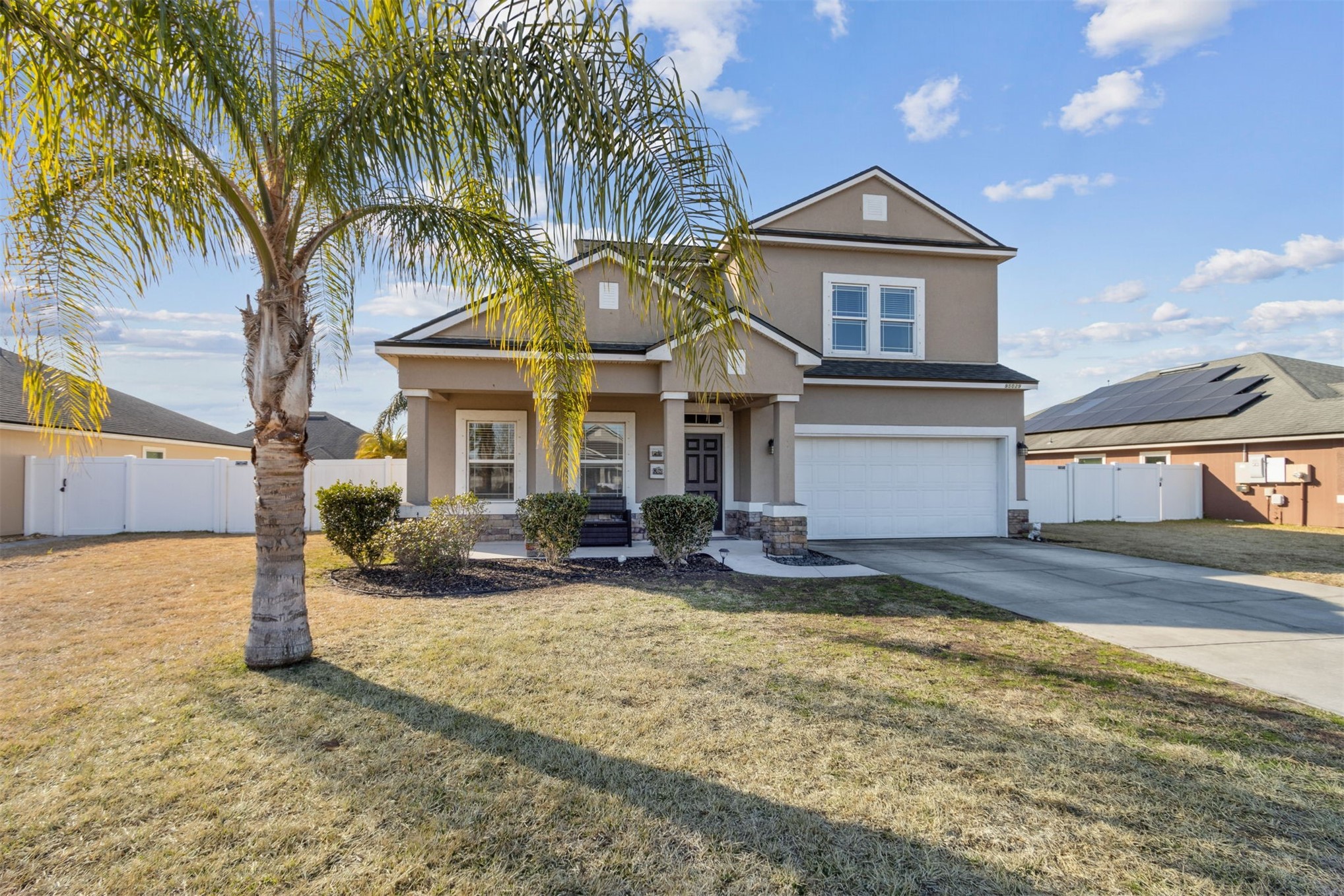 95029 Lavender Lane Fernandina Beach, FL 32034 - Photo 2 of 64 a view of a yard in front of house