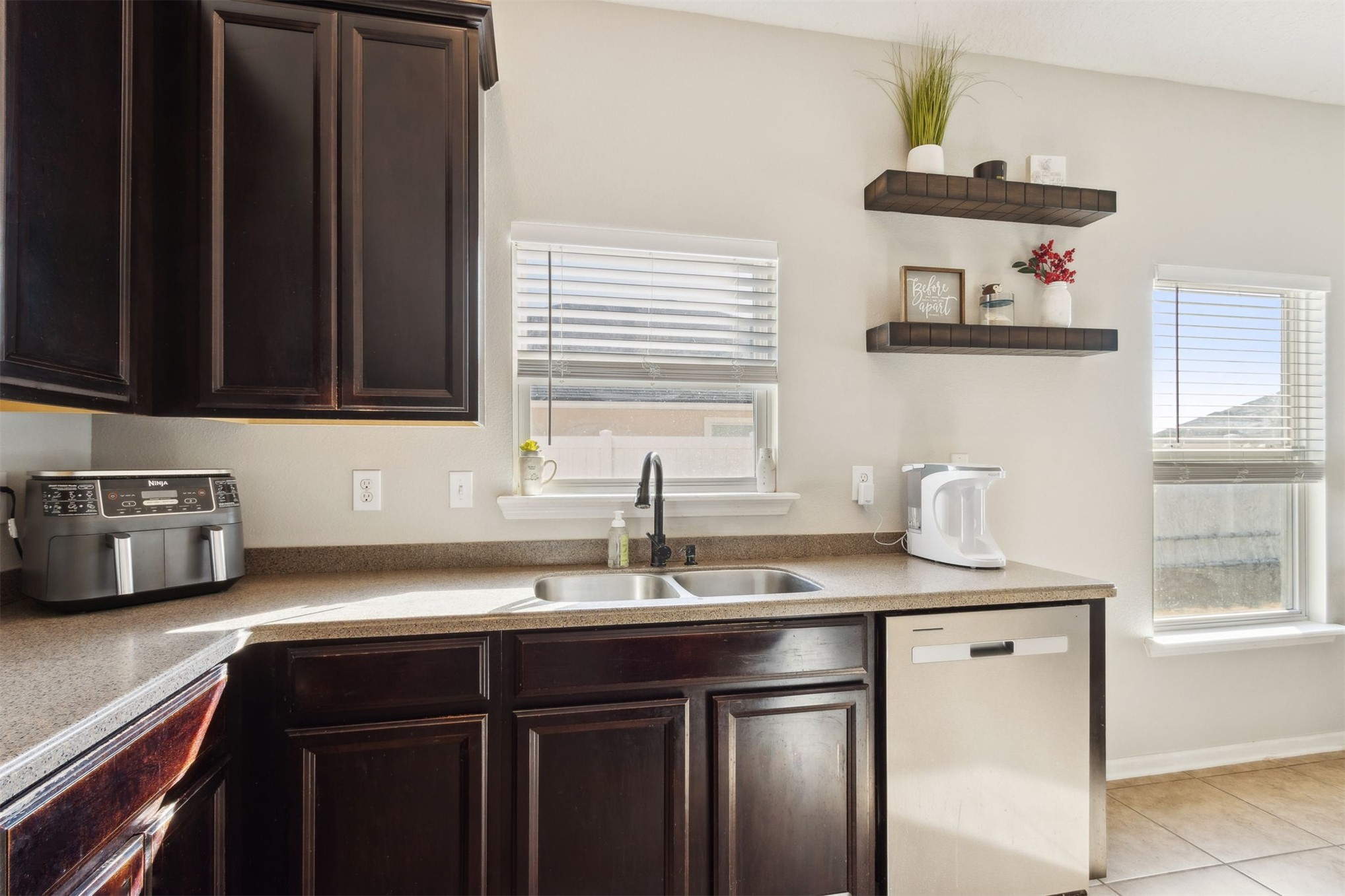 95029 Lavender Lane Fernandina Beach, FL 32034 - Photo 22 of 64 a kitchen with stainless steel appliances a sink stove and cabinets