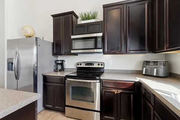 a bathroom with 2 sink and a mirror