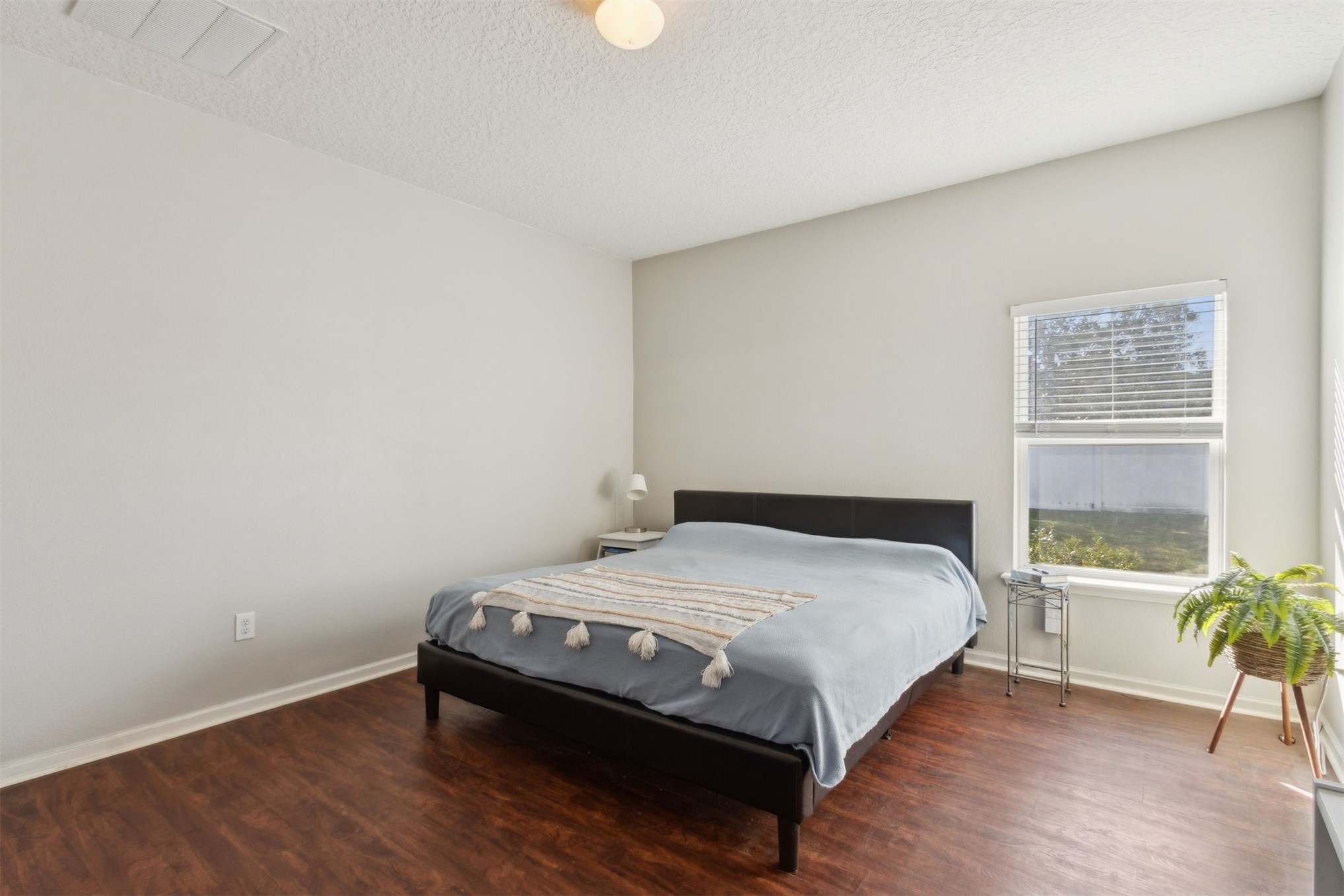 95029 Lavender Lane Fernandina Beach, FL 32034 - Photo 26 of 64 a bedroom with a bed and a large window
