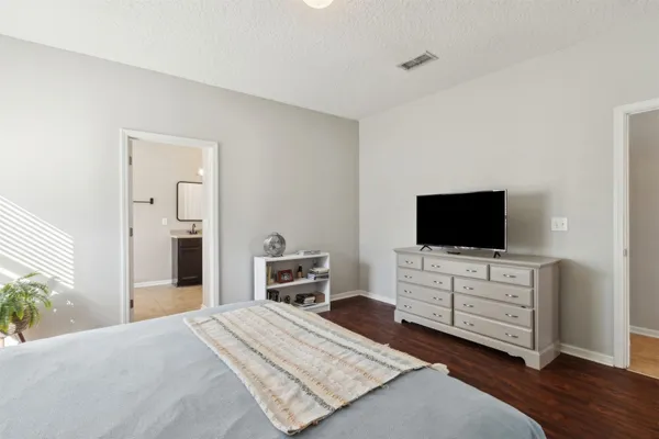 a view of a livingroom with furniture and a window
