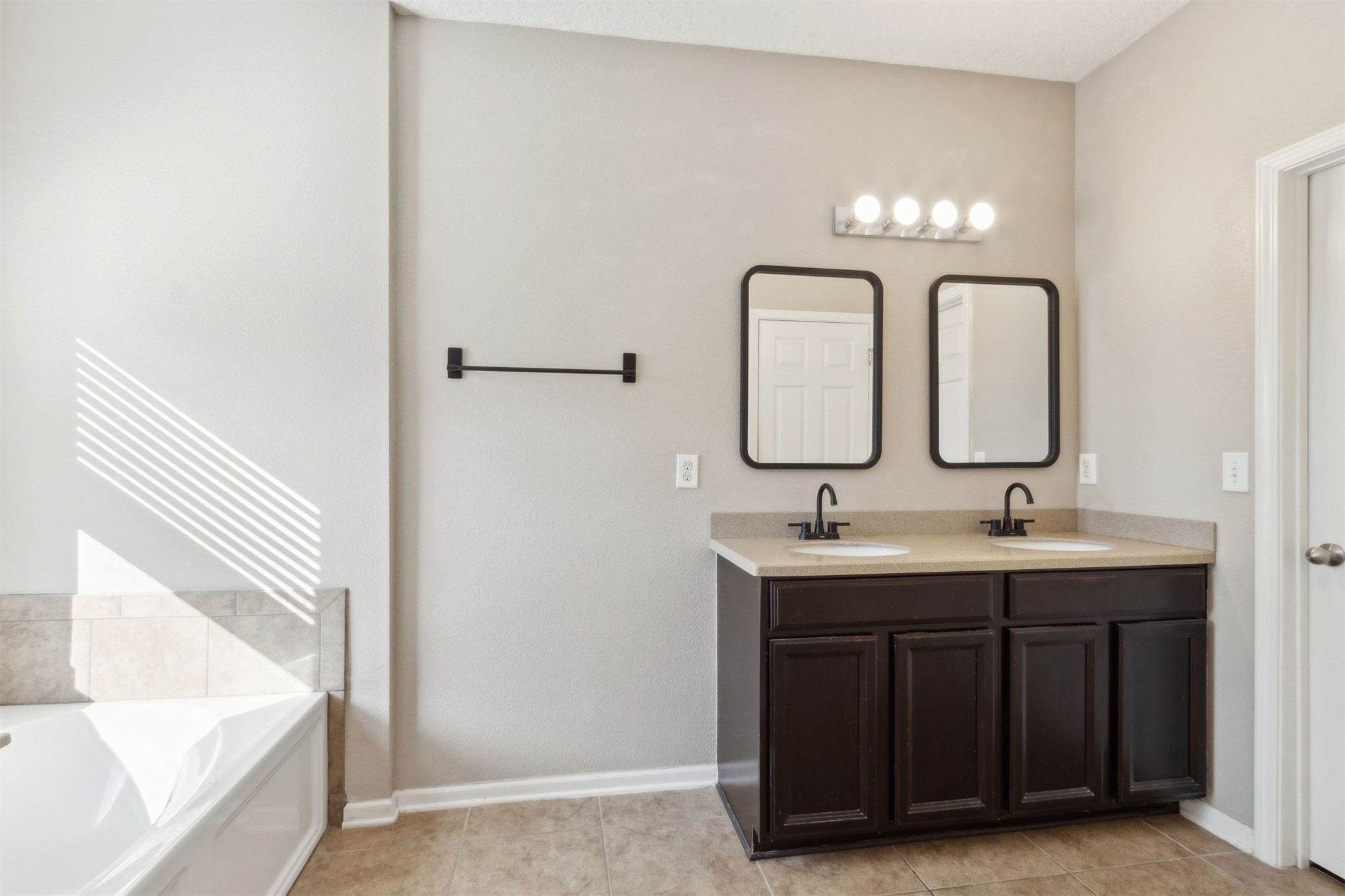 95029 Lavender Lane Fernandina Beach, FL 32034 - Photo 28 of 64 a bathroom with 2 sink and a mirror