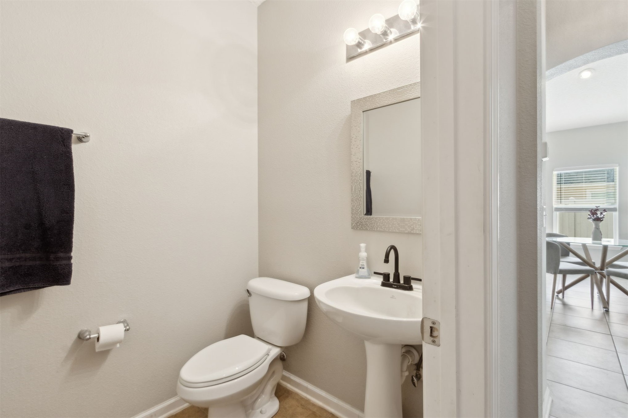 95029 Lavender Lane Fernandina Beach, FL 32034 - Photo 31 of 64 a bathroom with a sink a toilet a mirror and shower